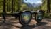 A pair of MemoMind smart glasses resting on a wooden desk.