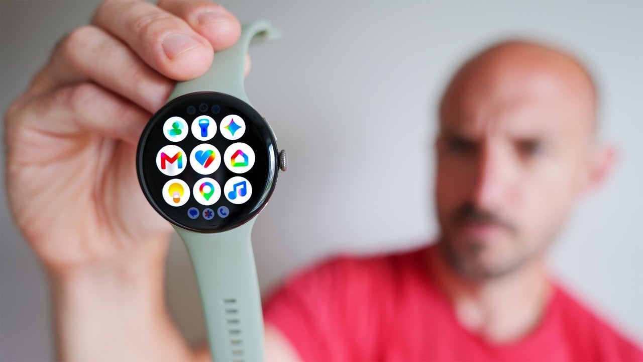 Google Pixel Watch 5 worn on a wrist showing the clock face.