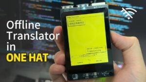 A Raspberry Pi board connected to a compact offline translator setup.