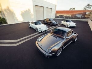 Exterior view of the RUF EHRA widebody sports car on display.