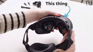 The Steam Frame headset next to its unboxed accessories
