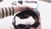 The Steam Frame headset next to its unboxed accessories