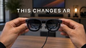 Front view of the XREAL Aura AR glasses showing the central camera