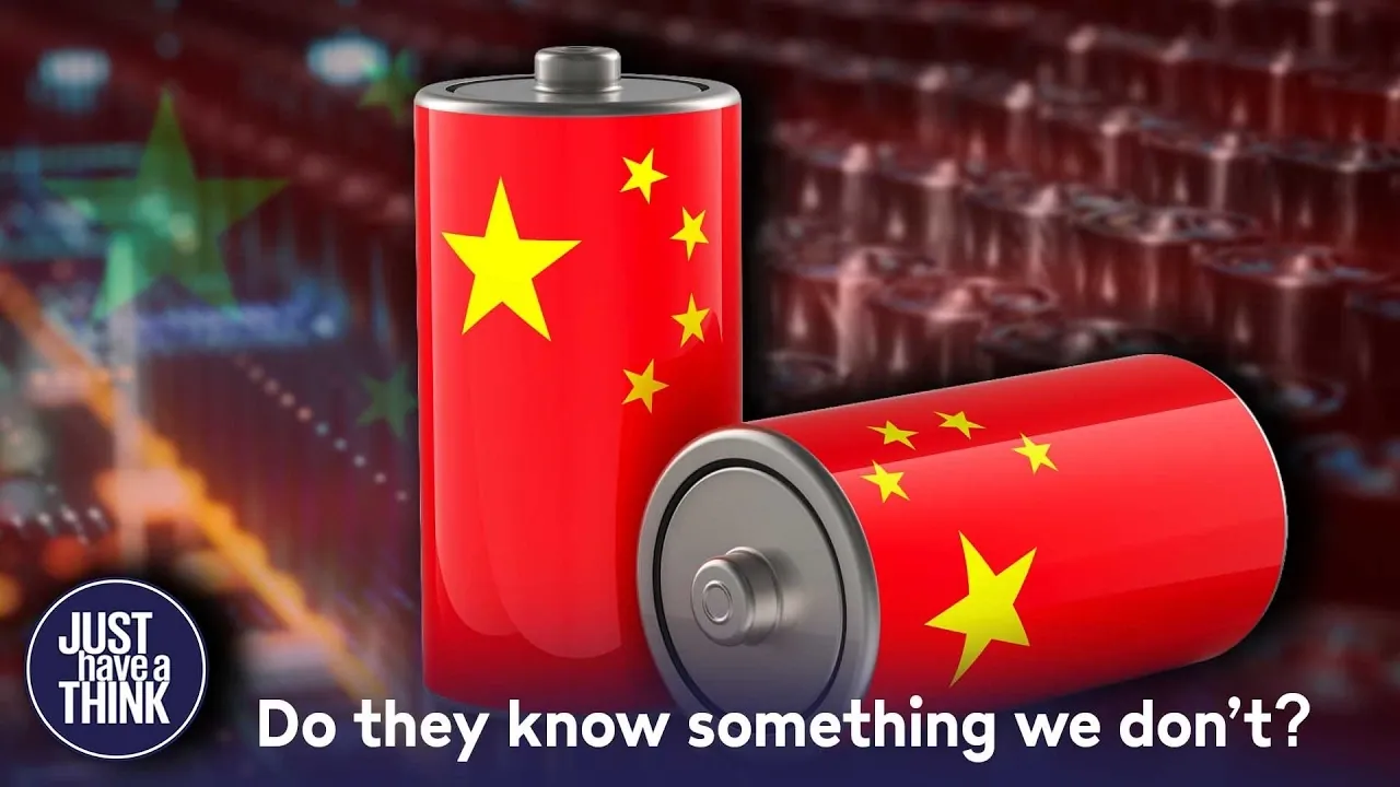 Inside a modern battery manufacturing plant with automated assembly lines.