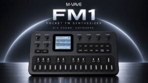 The compact M-VAVE FM1 synthesizer resting on a studio desk.