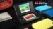 The Anbernic RG DS Plus handheld console resting on a desk.