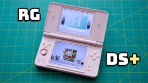 Front view of the Anbernic RGDS Plus showing the dual screens and button layout.