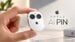 Conceptual mockup of a small circular Apple AI pin clipped to a shirt