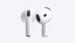 Apple AirPods 5 resting inside their charging case.