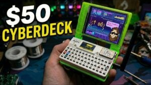 Fully assembled $50 mini cyberdeck showing a custom matrix code animation.