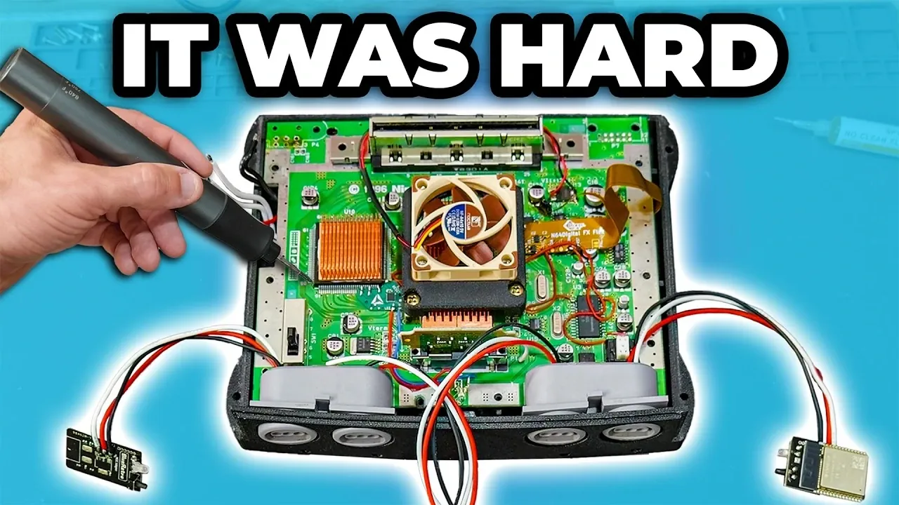 A close-up view of the RetroGem HDMI modification installed on the Nintendo 64 motherboard.