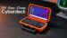 A Galaxy S10 smartphone mounted inside a modified tackle box cyberdeck.