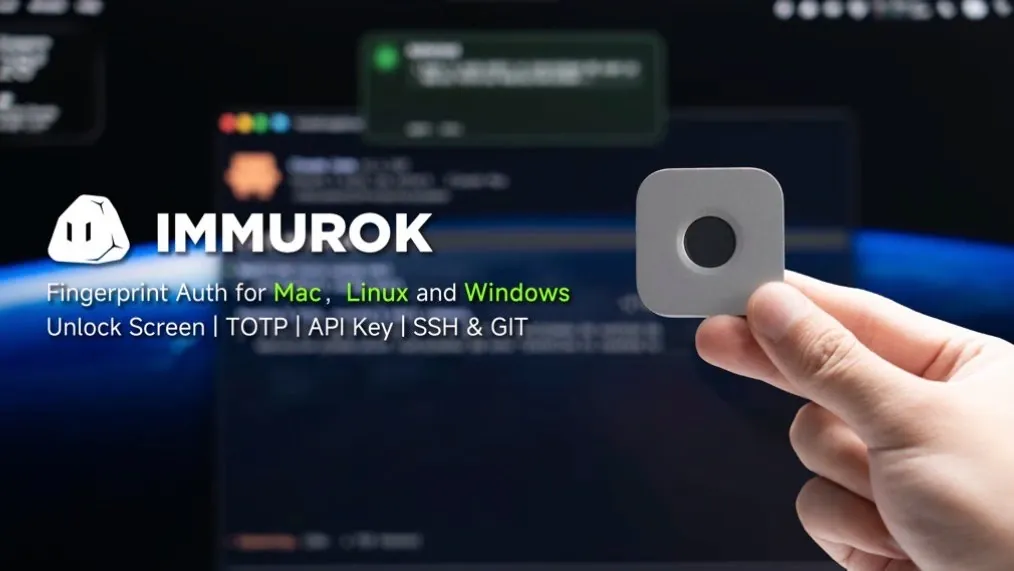 The immurok wireless fingerprint auth key resting on a wooden desk.