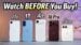 Person holding the iPhone Duo while reviewing pricing charts