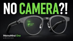 MemoMind One smart glasses resting on a desk.