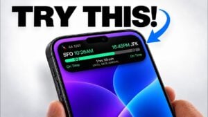 A user swiping the Dynamic Island on an iPhone to dismiss a live activity