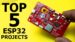 An ESP32 development board connected to a breadboard with jumper wires.