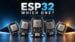 A collection of different ESP32 microcontroller boards arranged on a table.