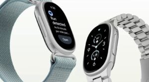 The Fitbit Edge fitness tracker displaying the new Google-inspired interface.