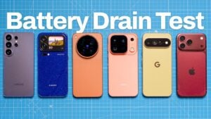Six flagship smartphones lined up for a battery drain test comparison.