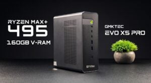 The GMKtec EVO X5 Pro mini PC standing vertically on a desk.