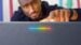 A sleek Googlebook laptop showing its premium lightweight design and 2K touchscreen.