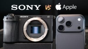 An iPhone 18 Pro and a Sony a6700 placed side by side on a table.