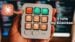 Nine customizable buttons on the keypad displaying different application icons on their individual screens.