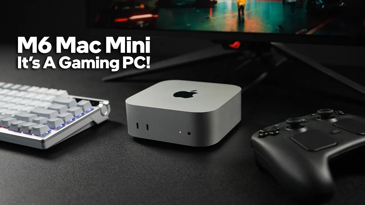 The new M6 Mac Mini sitting on a desk next to a monitor.