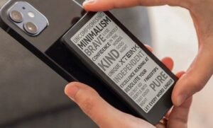The X4 Pro mini e-reader displaying a book page on its screen.