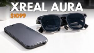 The XREAL Aura augmented reality glasses resting on a flat surface.